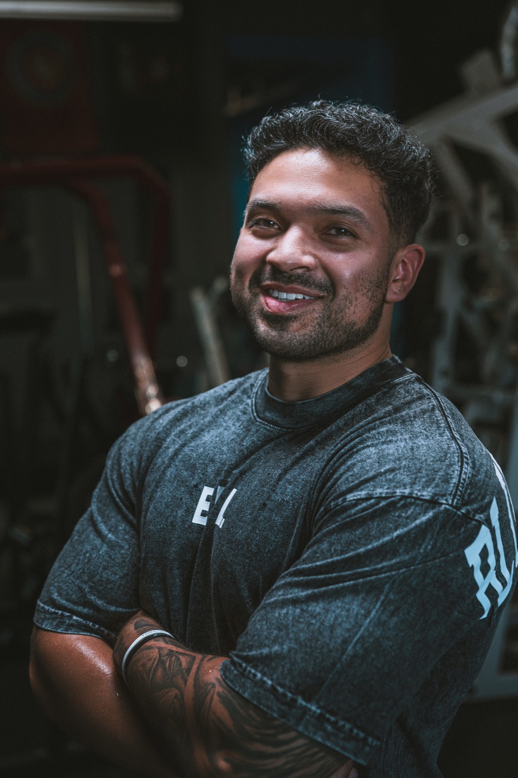 Elijah Robles smiling in the gym.